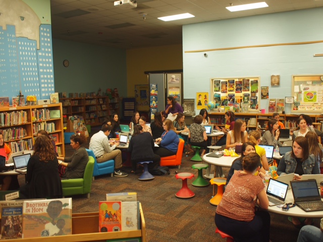 Staff Meetings in the New Library *adults in kids chairs vs. kids in adult chairs